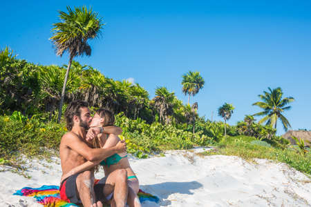 Young Couple Enjoying beautiful beach, Riviera Maya.の写真素材