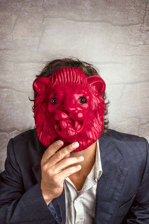 Work joker, using a mask on a job suit.の写真素材
