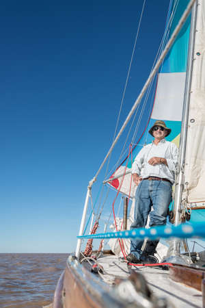Adult relaxing leisure activity. Sailing South America.の写真素材