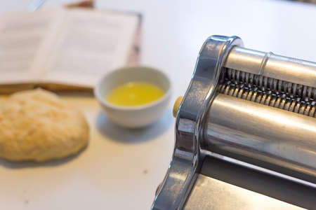 Cooking Home Made Spaghetti with traditional italian recepie and pasta machine.の写真素材