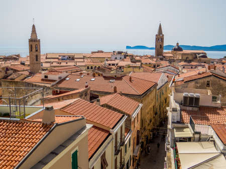 Alghero, Sardinia, Italy - Panoramic aerial view of the old town from the Tower of Porta Terra (Door Land)の写真素材