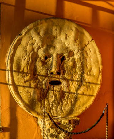 Bocca della Verita (English: The Mouth of Truth) in the portico of the church of Santa Maria in Cosmedin (St. Mary in Cosmedin) in Rome, Italyのeditorial素材