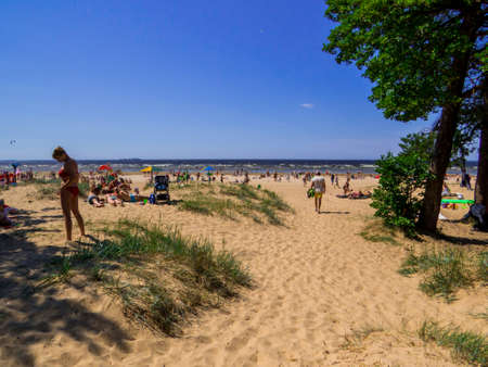 Sestroretsk, Russia - June 24, 2020: People on the beach of Sestroretsk, near St. Petersburg.のeditorial素材