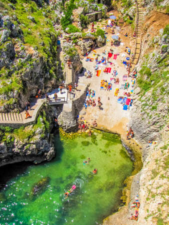GAGLIANO DEL CAPO, ITALY - JULY 27, 2009: Aerial view of the famous beach of "Il Ciolo".のeditorial素材