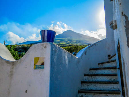 STROMBOLI, ITALY - JULY 17, 2014: Picturesque house with the volcano in the background.のeditorial素材