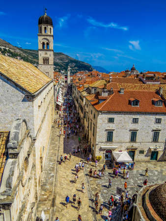 DUBROVNIK, CROATIA - AUGUST 8, 2015: Aerial view of the Stradun (or Placa), the pedestrian main street crowded by tourists and locals.のeditorial素材