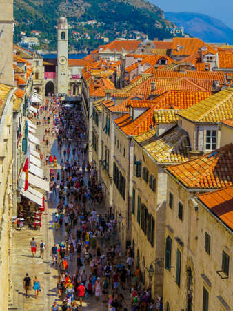DUBROVNIK, CROATIA - AUGUST 8, 2015: Aerial view of the Stradun (or Placa), the pedestrian main street crowded by tourists and locals.のeditorial素材