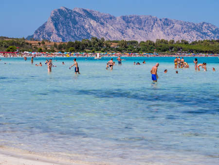 STINTINO, ITALY - JULY 20, 2016: Unidentified people in the sun on the famous La Pelosa Beach in Stintino, Sardinia, Italy.のeditorial素材