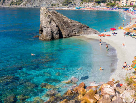 MONTEROSSO AL MARE, ITALY - JULY 28, 2016: Panoramic summer view of the beach in Monterosso, Cinque Terre, Italy.のeditorial素材