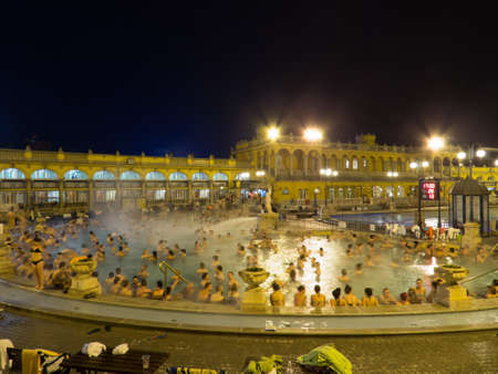 BUDAPEST, HUNGARY - NOVEMBER 19, 2016: Night view of the outdoor pool in Szechenyi Thermal Bath.のeditorial素材