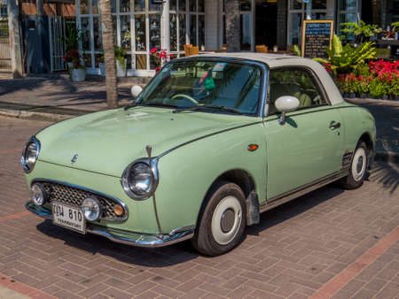 PATTAYA, THAILAND - DECEMBER 21, 2016: Nissan Figaro retro car on a parking lot near the beach.のeditorial素材