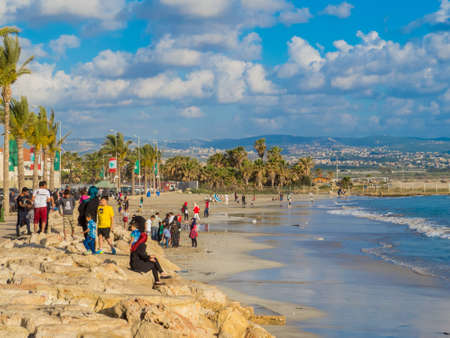 TYRE, LEBANON - MAY 21, 2017: People at sunset on the seafront.のeditorial素材
