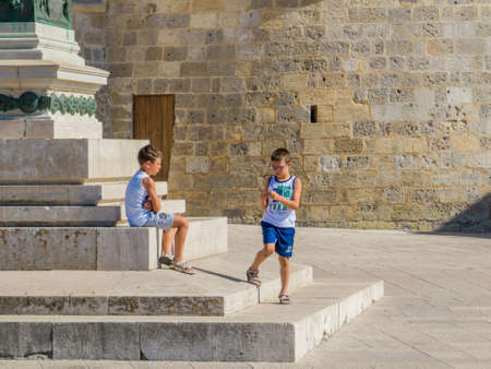 OTRANTO, ITALY - JULY 17, 2017: Kids in the old town.のeditorial素材