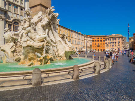 ROME, ITALY - AUGUST 28, 2017 - Sunny view of Piazza Navona with the Fountain of the Four Rivers (Italian: Fontana dei Quattro Fiumi) in the foreground.のeditorial素材