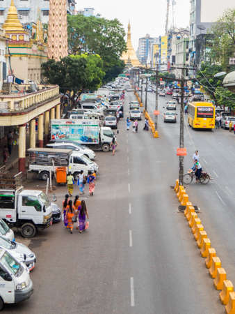 YANGON, MYANMAR - JANUARY 4, 2018: View of Maha Bandula Road with the Sule Pagoda in the background.のeditorial素材