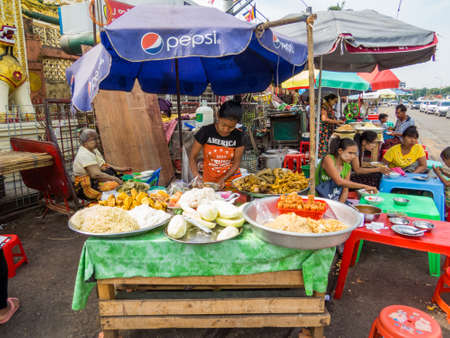 YANGON, MYANMAR - JANUARY 4, 2018: Traditional Burmese street restaurant.のeditorial素材