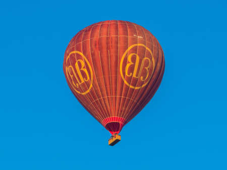 BAGAN, MYANMAR - JANUARY 6, 2018: Hot air balloon flying at sunrise over the temples of Old Bagan.のeditorial素材