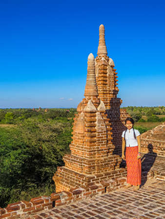 BAGAN, MYANMAR - JANUARY 6, 2018: Beautiful Burmese girl on the "Secret Temple", so called by the locals, because most tourists don't know about it.のeditorial素材