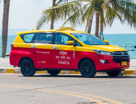 PATTAYA, THAILAND, JANUARY 31, 2018: Taxi in front of the Dongtan Beach in Jomtien.のeditorial素材