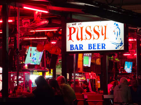 PATTAYA, THAILAND - FEBRUARY 4, 2018: Sign of the "Pussy Bar Beer" in the downtown.のeditorial素材
