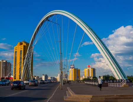 ASTANA, KAZAKHSTAN - JUNE 21, 2018: View of the Ramstore Arch Bridge on Qabanbay Batyr Ave.