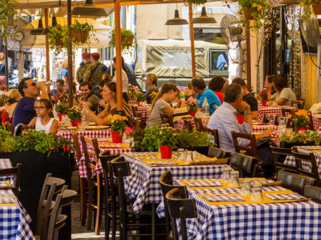ROME, ITALY - JULY 26, 2018: Traditional Roman restaurant in Piazza Campo de' Fiori.のeditorial素材