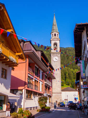 PINZOLO, ITALY - AUGUST 28, 2018: View of the downtown with the bell tower of the Church of San Lorenzo (St. Lawrence) in the background.のeditorial素材