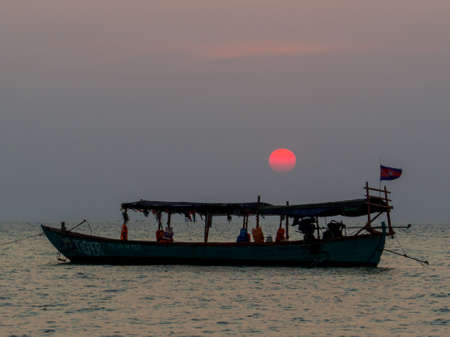 Traditional boat at sunset on Otres Beach, Sihanoukville, Cambodiaのeditorial素材