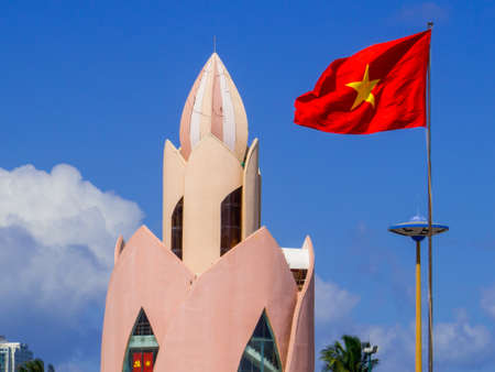 Tower Incense and Vietnamese Flag. In Nha Trang, Vietnamのeditorial素材