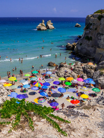 Torre dell'Orso, Italy - August 6, 2021: Aerial view of the crowded beach.のeditorial素材