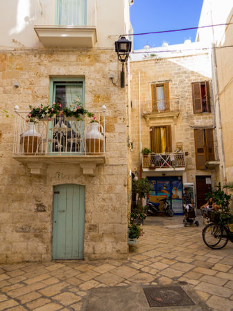 Polignano a Mare, Italy - August 6, 2021: Picturesque street in the old town.のeditorial素材
