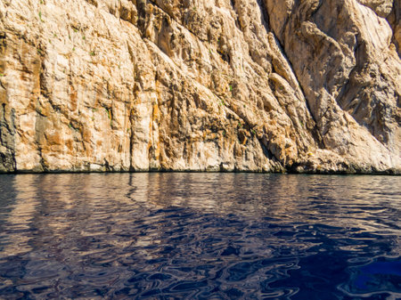 View of the coastline cliff of Tavolara Island in Sardinia, Italyの写真素材