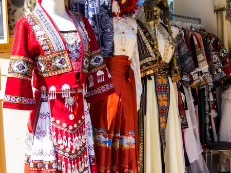 Traditional Clothes of Lijiang on sale in a shop in the old town. In Lijiang, Yunnan, Chinaの写真素材