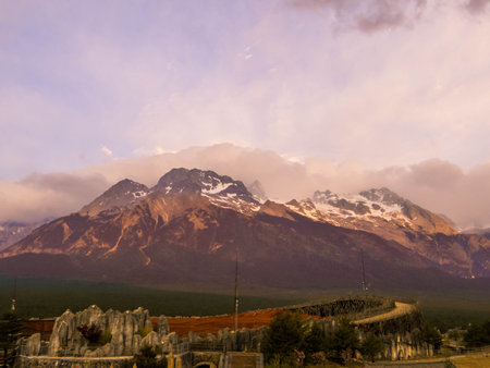 Sunrise view of the Jade Dragon Snow Mountain (or Yulong Snow Mountain) in Lijiang, Yunnan, Chinaの写真素材