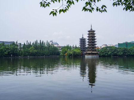 View of The Sun and Moon Pagodas on the Shan Lake. In Guilin, China
