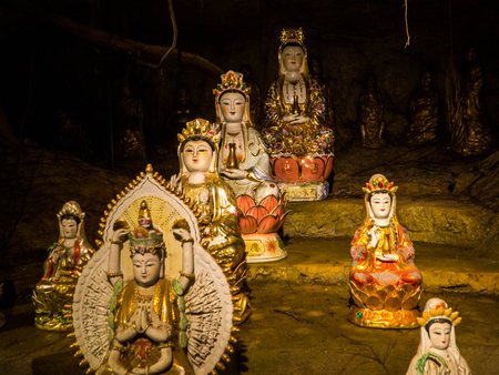 Buddha Statues in the Fubo Mountain Cave in Guilin, Chinaの写真素材