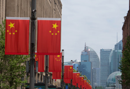 Chinese flags ib the famous Nanjing Road in Shanghai, Chinaの写真素材