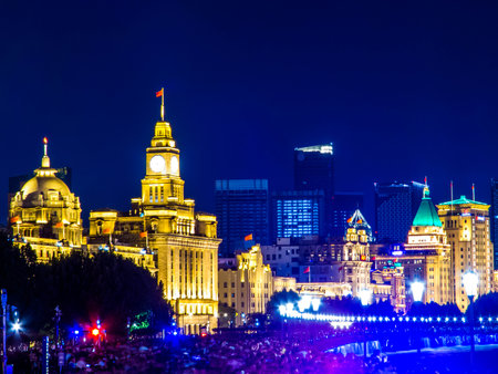 Night view of the Custom House in front of the Huangpu River. In Shanghai, China