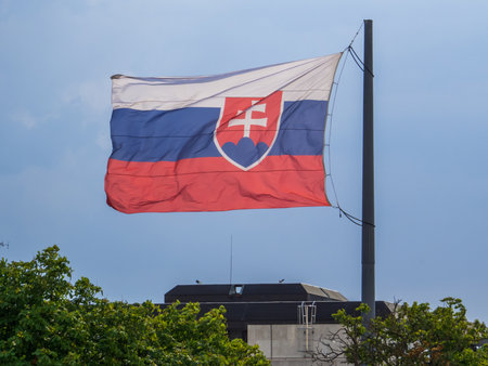 Waving Slovak flag in front of the Bratislava Casteの写真素材