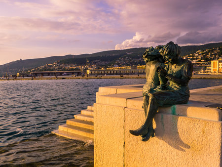 View of The Girls of Trieste monument at sunset. In Trieste, Italyの写真素材