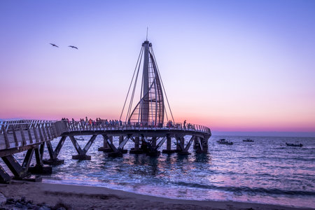 Los Muertos Pier at sunset - Puerto Vallarta, Jalisco, Mexicoのeditorial素材
