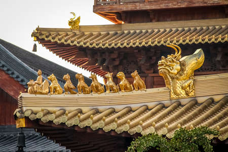 Details of roof on Buddhist Jing An Tranquility Temple - Shanghai, Chinaの写真素材