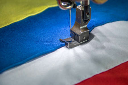 Professional sewing machine with four colors fabricの写真素材