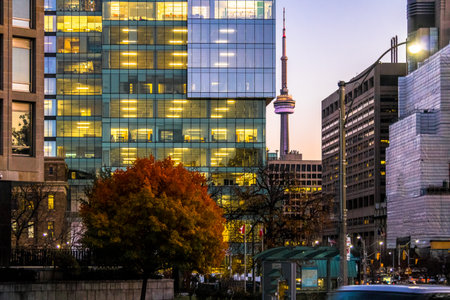 Colorful modern buildings of downtown Toronto and CN Tower at night - Toronto, Ontario, Canadaのeditorial素材