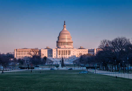 United States Capitol Building at sunset - Washington, DC, USAの写真素材