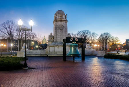 Liberty Bell replica in front of Union Station and Christopher Columbus statue at night - Washington, DC, USAの写真素材
