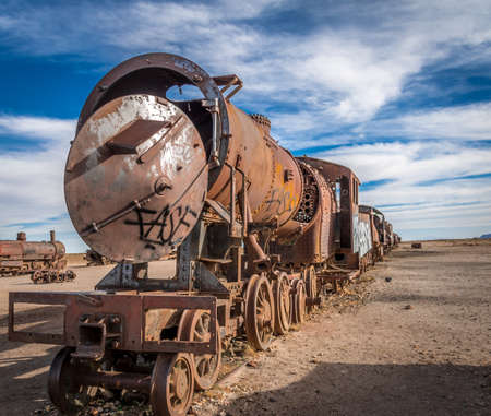 Abandoned rusty old train cemetery in train - Uyuni, Boliviaの写真素材