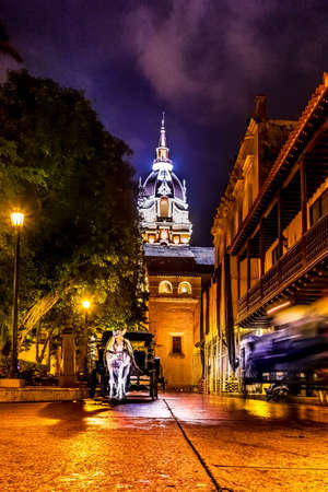 Street and Santa Catalina de Alejandria Cathedral at night - Cartagena de Indias, Colombiaの写真素材