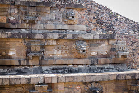 Carving details of Quetzalcoatl Pyramid at Teotihuacan Ruins - Mexico City, Mexicoの写真素材