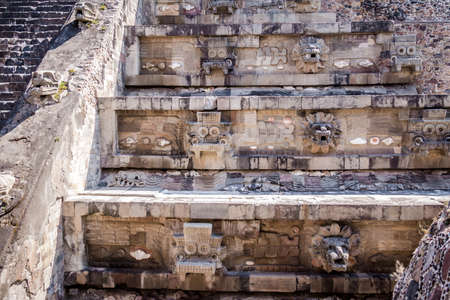 Carving details of Quetzalcoatl Pyramid at Teotihuacan Ruins - Mexico City, Mexicoの写真素材